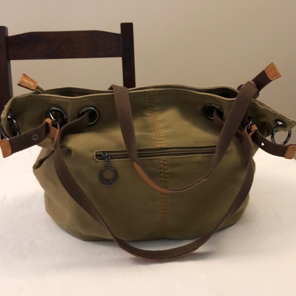 Super cute and roomy Canvas Shoulder Bag in tan.
